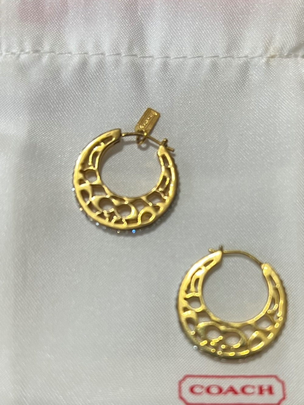 Vintage Coach Gold plate hoop earrings w/ logo cutout design, pave crystal edges